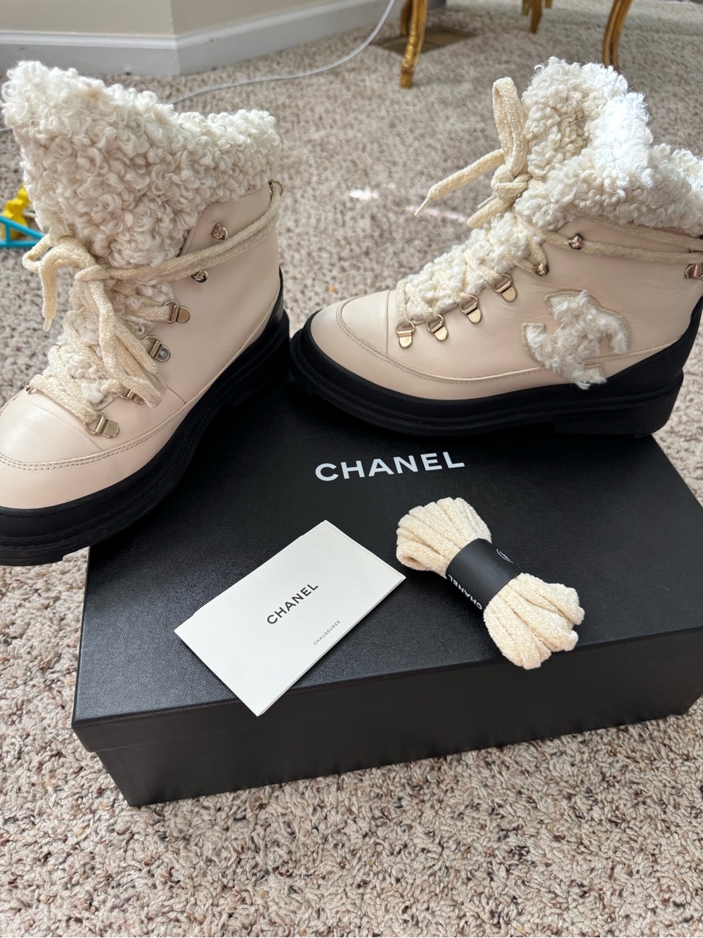 CHANEL Cream Shearling-Trim Lace-Up Winter Boots with Black Sole